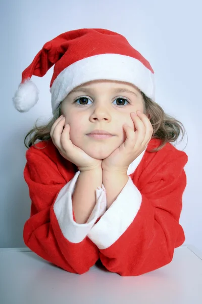 Chica en el sombrero de Santa —  Fotos de Stock