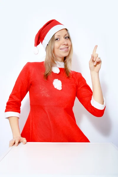 Flicka i santa röd hatt — Stockfoto