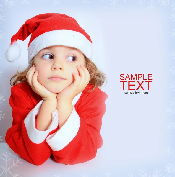 サンタさんの帽子の少女 — ストック写真