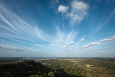 Sky above small mountains clipart