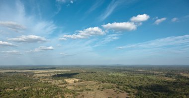 Sky above small mountains panorama clipart