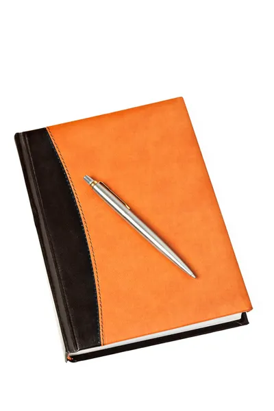 Diário e caneta na mesa isolados — Fotografia de Stock