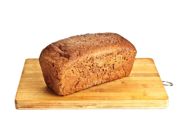 Ahşap masa üzerinde taze ekmek — Stok fotoğraf