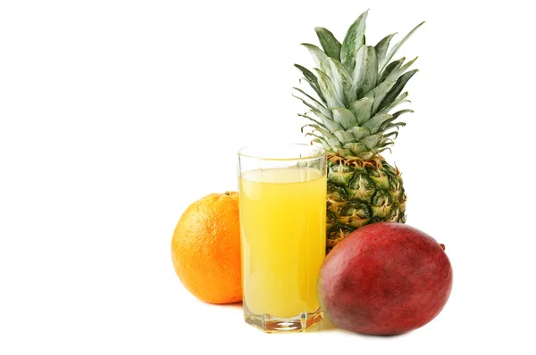 Świeże tropikalne owoce i sok — Zdjęcie stockowe