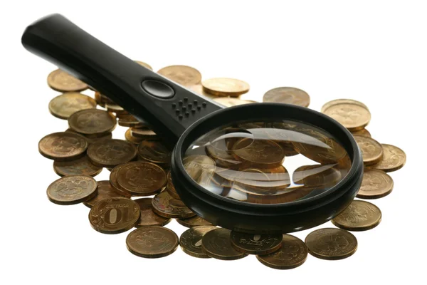 Magnifier and coins — Stock Photo, Image