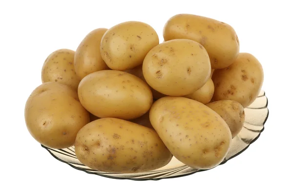 Patates bir cam plaka — Stok fotoğraf