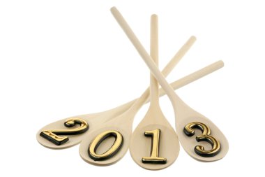 Number 2013 on spoons are isolated on a white background clipart