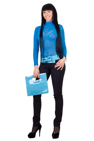 Chica sonriente con un bolso azul. Aislado — Foto de Stock