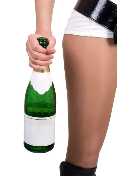 Una joven con una botella de champán. Aislado — Foto de Stock