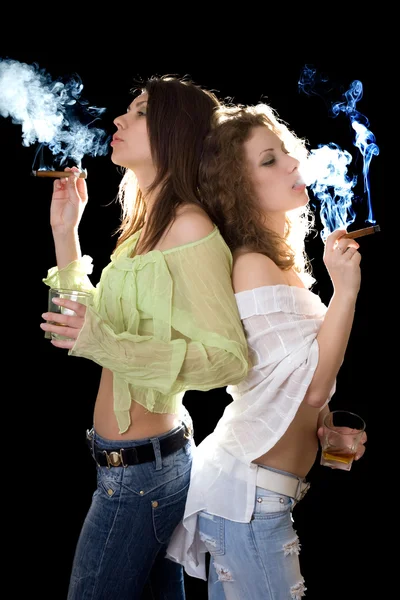 Portrait of the two pretty girlfriends with a cigars — Stock Photo, Image