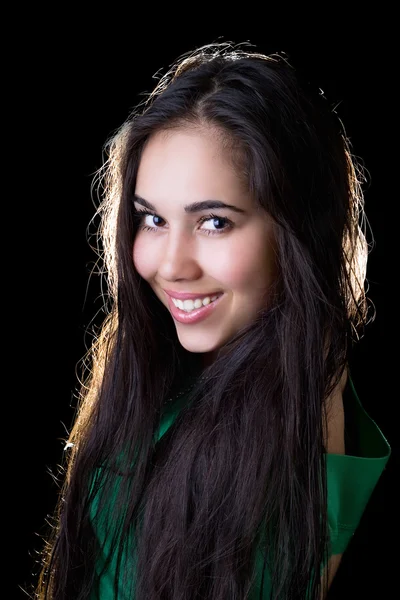 Portrait of the smiling girl in a green jacket — Stock Photo, Image