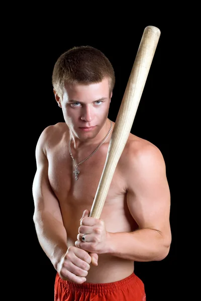 裸照的年轻男子用球棒 孤立在黑色 — 图库照片