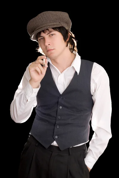 レトロなスタイルでタバコを持つ若い思慮深い男 — ストック写真