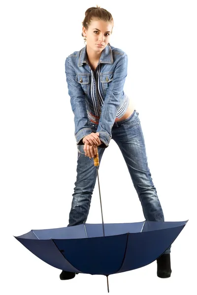 Speelse vrouw in een blauwe denim pak — Stockfoto