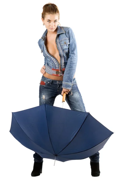 Speelse jonge vrouw in een blauw denim pak — Stockfoto