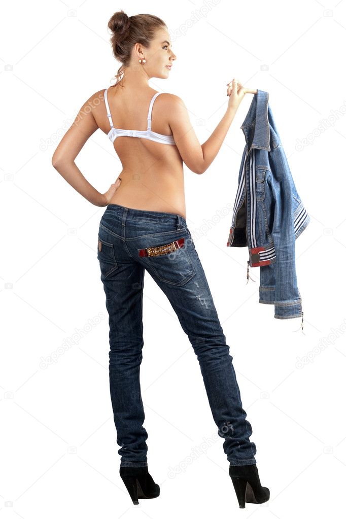 Sexy young woman in a denim suit