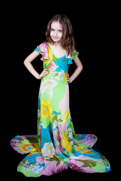 The stylish girl in an elegant dress — Stock Photo, Image