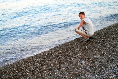 Smiling boy at the beach