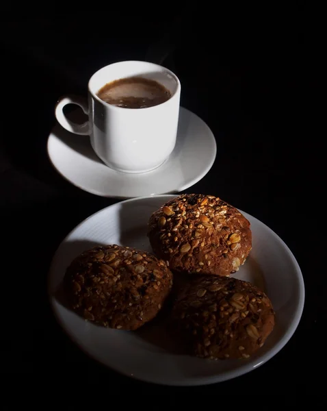 A cup of coffee and cookies — Stock Photo, Image