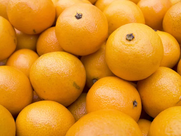 Tangerines on a counter macro — Stock Photo, Image