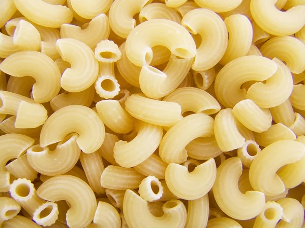 Pasta small horns background — Stock Photo, Image