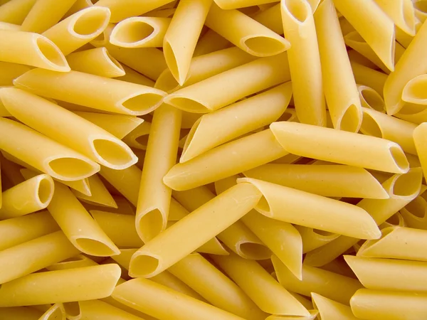 Pasta tubules background — Stock Photo, Image