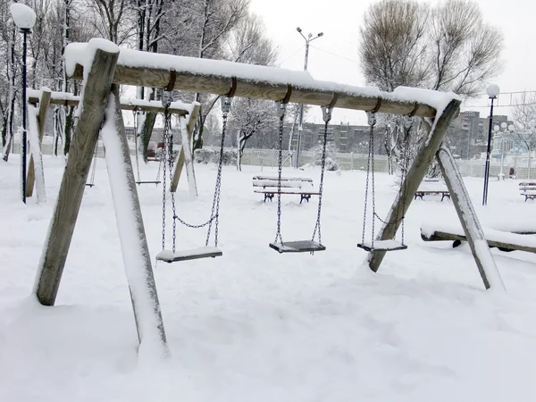 Parque infantil en invierno — Foto de Stock