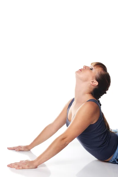 Beyaz kız beyaz zemin üzerine izole yoga poses yapıyor. — Stok fotoğraf
