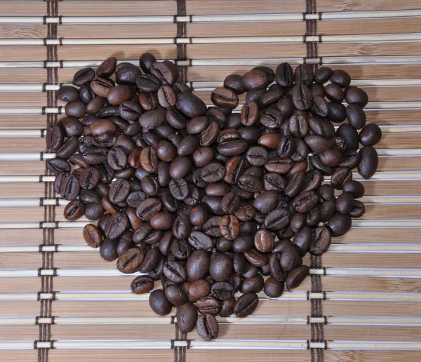 一颗心的咖啡的沙粒 — 图库照片