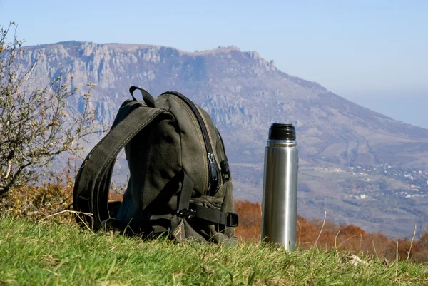Backpack and thermos — Stock Photo, Image