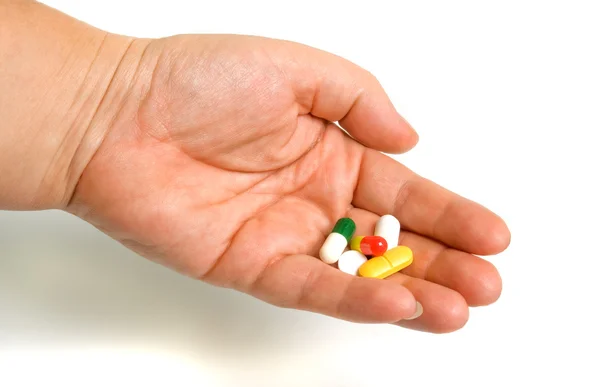 Tabletten in der Hand — Stockfoto