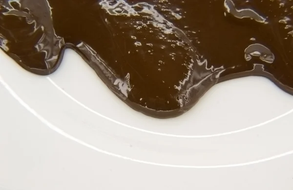 Бег Шоколада Белом Фоне — стоковое фото