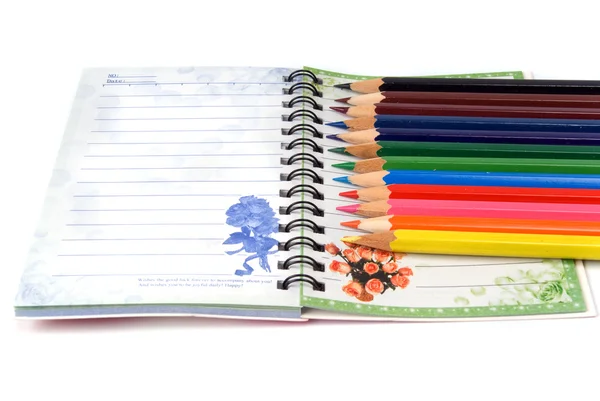 Cuaderno Crayón Sobre Fondo Blanco — Foto de Stock