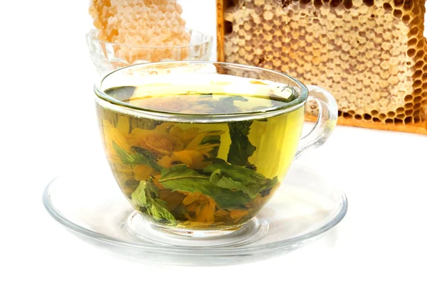 Травяной чай и соты — стоковое фото