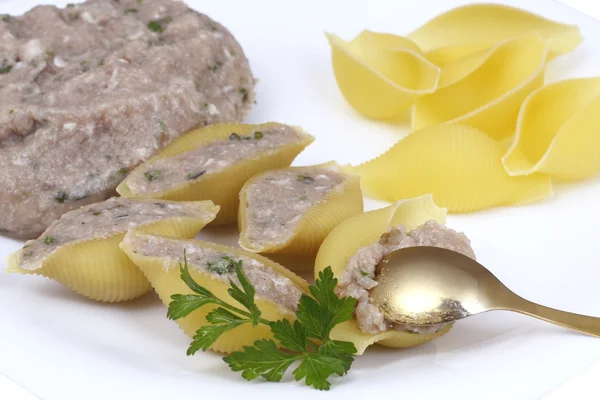 Uncooked pasta with minced meat — Stock Photo, Image