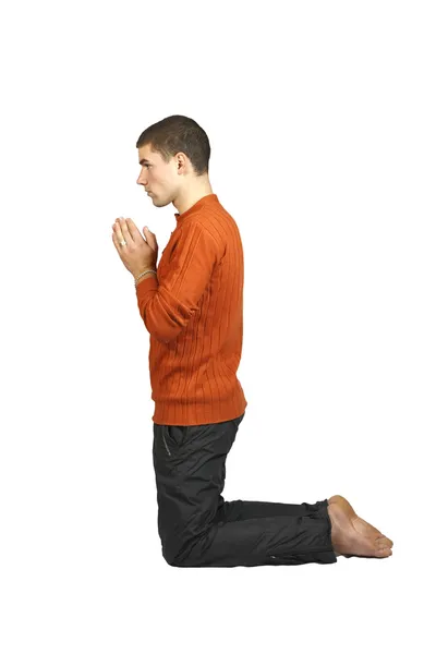 stock image A man praying on his knees