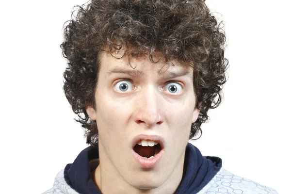 Young guy with a fright on his face — Stock Photo, Image