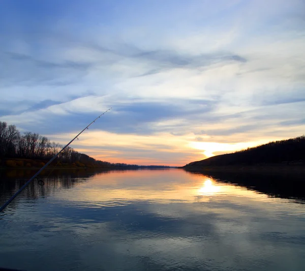 Fishing on evening river — Stock Photo, Image