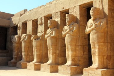 Ancient statues in Luxor karnak temple clipart