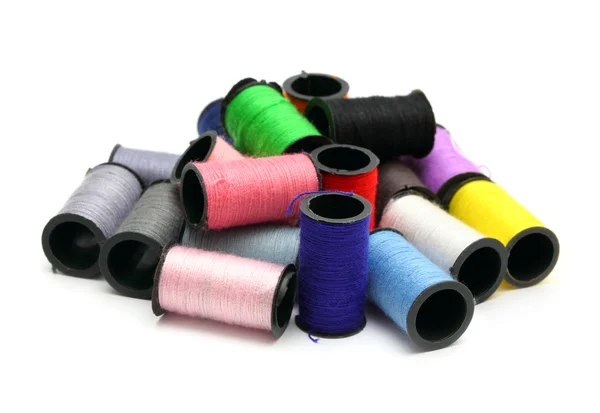 Lot of colored thread spools — Stock Photo, Image