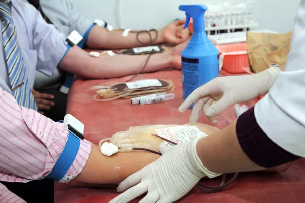 Blood donors in laboratory at donation — Stock Photo, Image