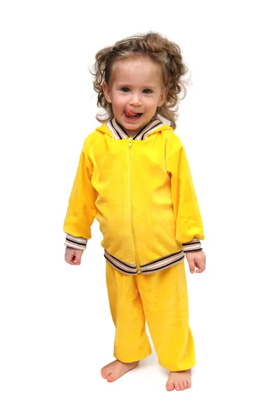 Schattig klein meisje in geel — Stockfoto