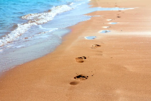 Stopy na písečné pláži — Stock fotografie