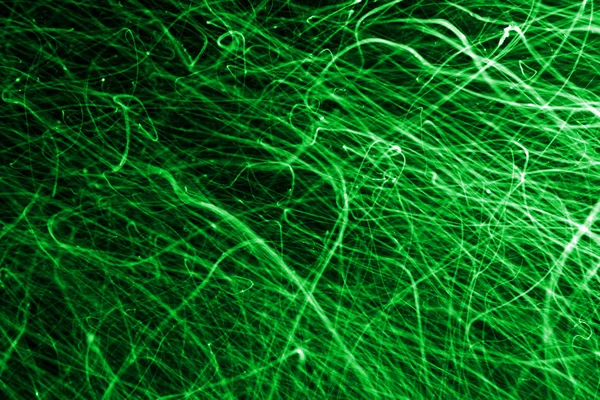 Abstract green chaos lines on black — Stock Photo, Image
