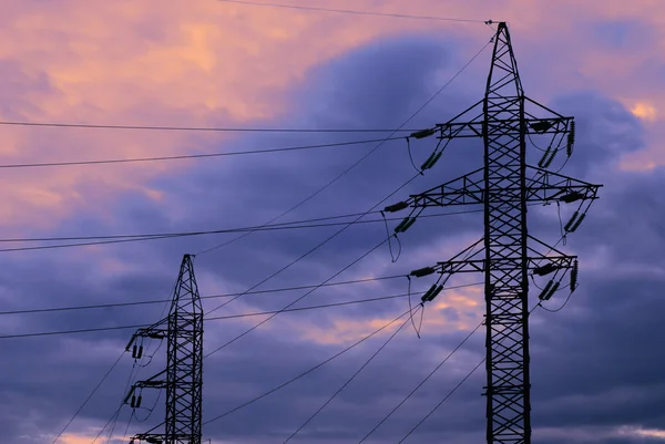 Sonnenuntergang und elektrifizierte Strecke — Stockfoto