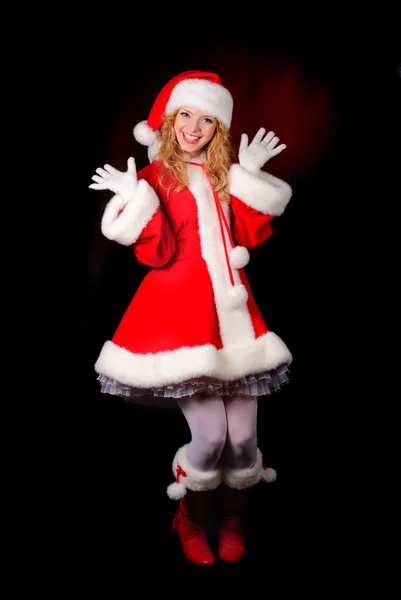 Christmas santa flicka på svart — Stockfoto