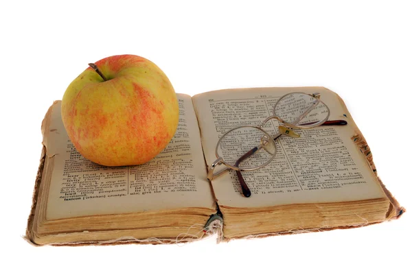 Apple a brýle na knize — Stock fotografie