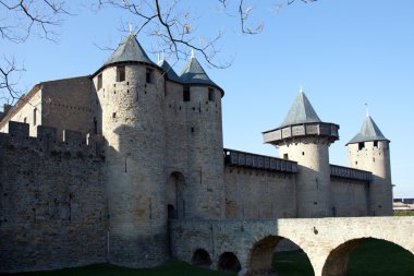 Walls and tower of the medieval castle clipart