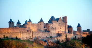 Medieval town of Carcassonne at sunset clipart