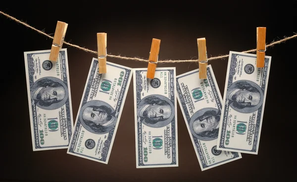 stock image Dollars Hanging on Rope with Clothespins